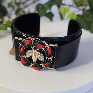 Black Open Cuff Bracelet with Gold Bee Emblem